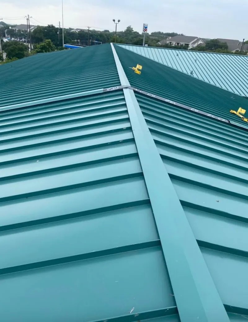 Green commercial metal roof ridge and valley for Metal Roof Repair in Salinas